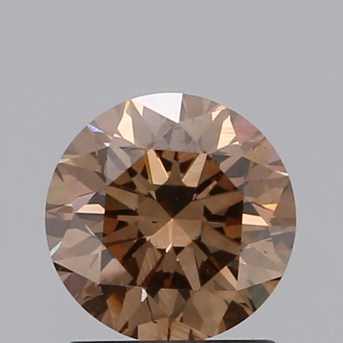 Loose Diamond - ROUND 1.26ct Fancy Brown VS2: Loose Diamond - ROUND 1.26ct Fancy Brown VS2 Source: Natural Shape: ROUND Carats: 1.26 Color: Fancy Brown Certification: GIA Video: