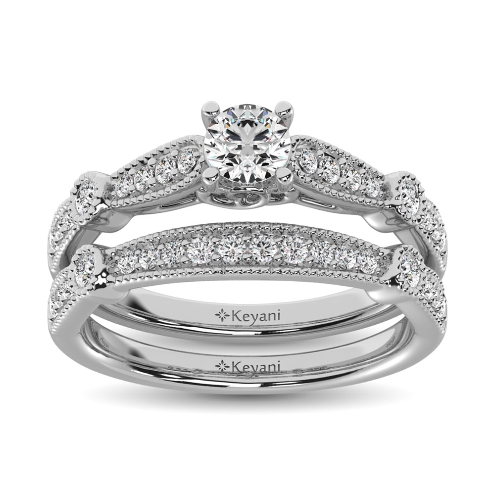 Diamond 3/4 Ct.Tw. Bridal Ring in 14K White Gold: Diamond 3/4 Ct.Tw. Bridal Ring in 14K White Gold 14k White Gold Stone Color: G-h Stone Clarity: Si2 Each ring is presented in standard size 6.5. Complimentary resizing is available between sizes 510 (