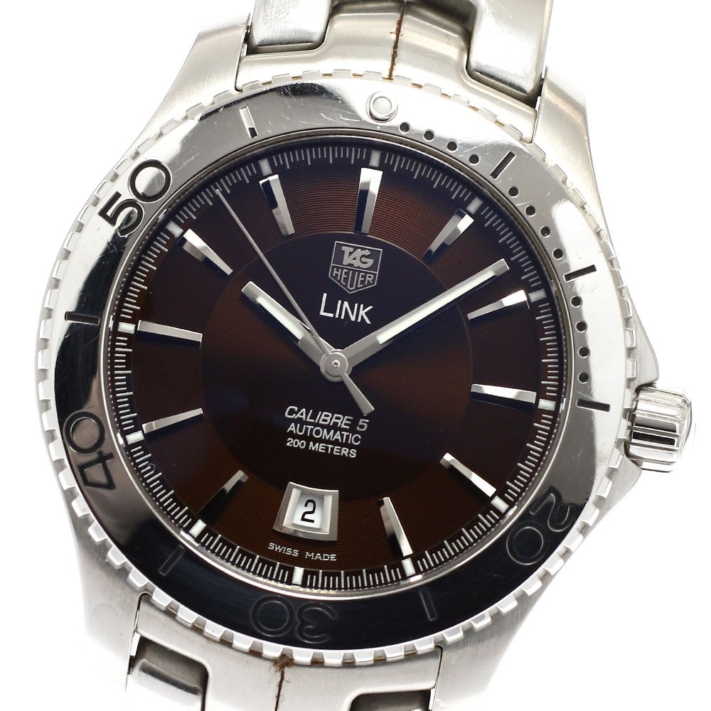TAG Heuer Link Automatic Stainless Steel Men's Wristwatch WJ201D.BA0591: TAG Heuer Link Automatic Stainless Steel Men's Wristwatch WJ201D.BA0591 This TAG Heuer Link Caliber 5 men's wristwatch features a stainless steel case and band with a brown dial and automatic movement