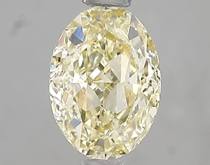 Loose Diamond - OVAL 1.08ct Fancy Yellow VS1: Loose Diamond - OVAL 1.08ct Fancy Yellow VS1 Source: This is a real non-mined Diamond that has been grown in a lab Shape: OVAL Carats: 1.08 Color: Fancy Yellow Certification: IGI Video: