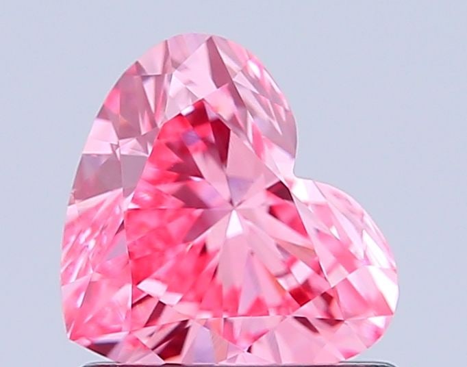 Loose Diamond - HEART 0.86ct Fancy Vivid Pink VS1: Loose Diamond - HEART 0.86ct Fancy Vivid Pink VS1 Source: This is a real non-mined Diamond that has been grown in a lab Shape: HEART Carats: 0.86 Color: Fancy Vivid Pink Certification: IGI Video: