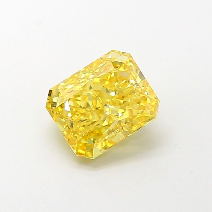 Loose Diamond - RADIANT 1.13ct Fancy Vivid Yellow VS2: Loose Diamond - RADIANT 1.13ct Fancy Vivid Yellow VS2 Source: This is a real non-mined Diamond that has been grown in a lab Shape: RADIANT Carats: 1.13 Color: Fancy Vivid Yellow Certification: IGI Vid