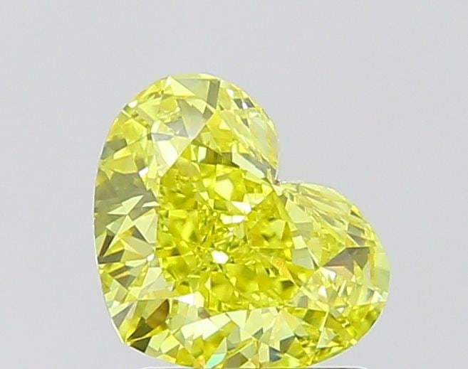 Loose Diamond - HEART 1.57ct Fancy Vivid Yellow VVS2: Loose Diamond - HEART 1.57ct Fancy Vivid Yellow VVS2 Source: This is a real non-mined Diamond that has been grown in a lab Shape: HEART Carats: 1.57 Color: Fancy Vivid Yellow Certification: IGI Video: