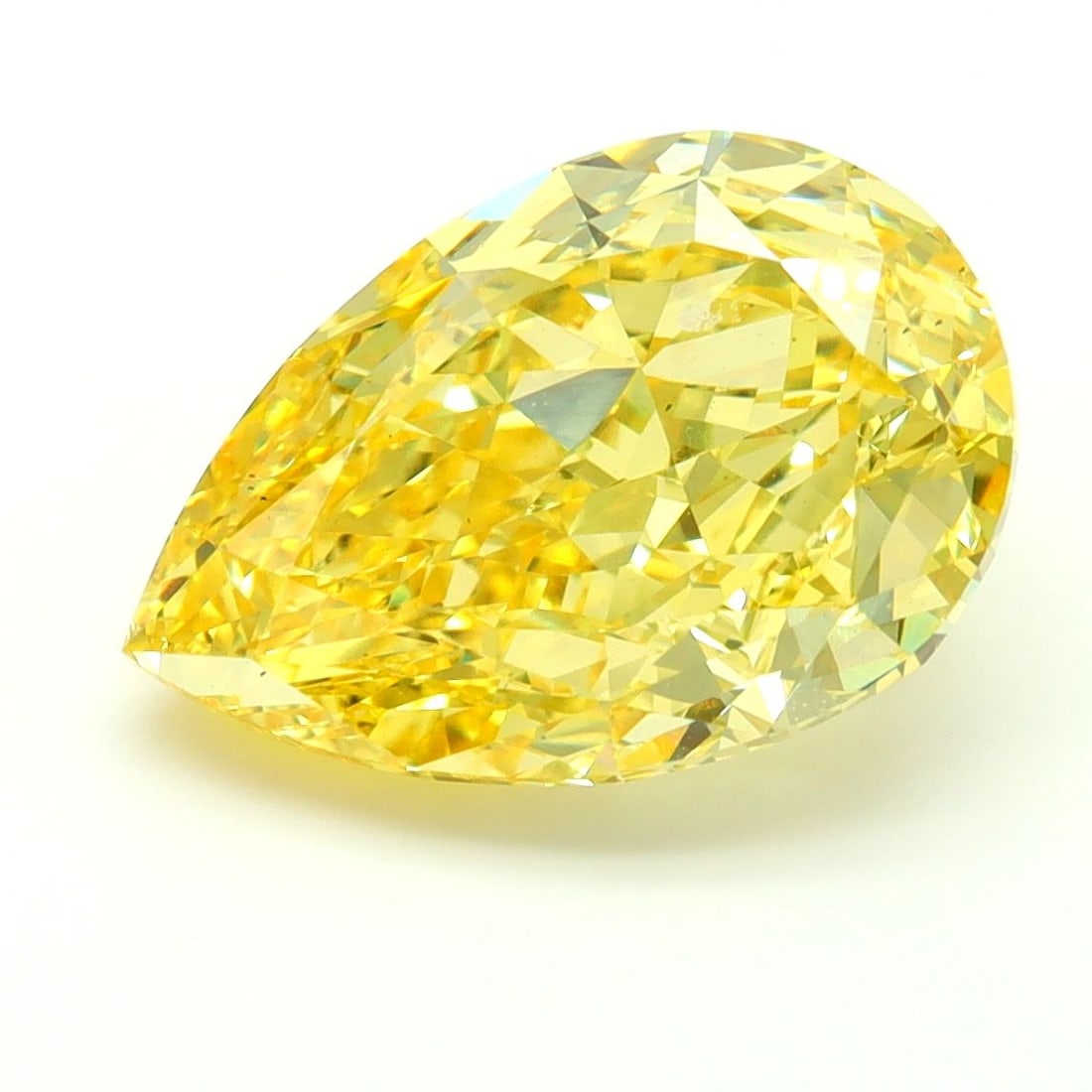 Loose Diamond - PEAR 5.23ct Fancy Vivid Yellow VS1: Loose Diamond - PEAR 5.23ct Fancy Vivid Yellow VS1 Source: This is a real non-mined Diamond that has been grown in a lab Shape: PEAR Carats: 5.23 Color: Fancy Vivid Yellow Certification: IGI Video: