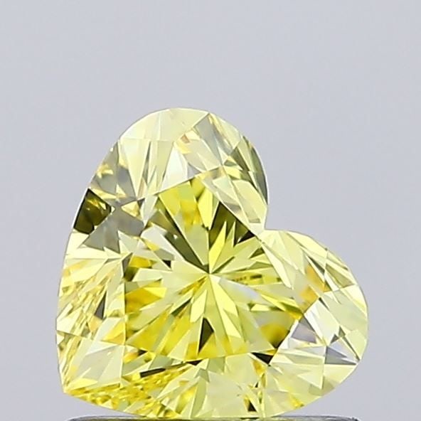 Loose Diamond - HEART 0.76ct Fancy Vivid Yellow VS1: Loose Diamond - HEART 0.76ct Fancy Vivid Yellow VS1 Source: This is a real non-mined Diamond that has been grown in a lab Shape: HEART Carats: 0.76 Color: Fancy Vivid Yellow Certification: IGI Video: