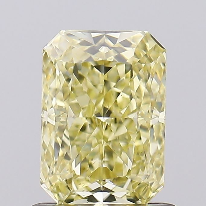 Loose Diamond - RADIANT 1.04ct Fancy Yellow VS1: Loose Diamond - RADIANT 1.04ct Fancy Yellow VS1 Source: This is a real non-mined Diamond that has been grown in a lab Shape: RADIANT Carats: 1.04 Color: Fancy Yellow Certification: IGI Video: