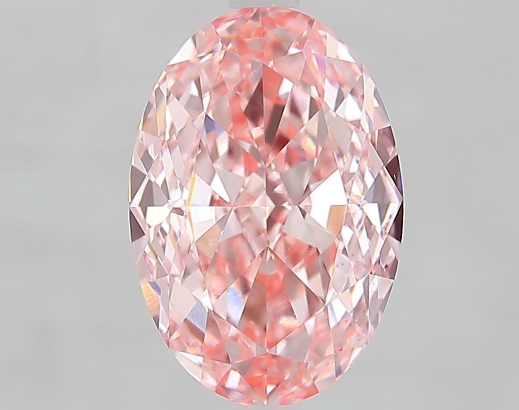 Loose Diamond - OVAL 4.1ct Fancy Vivid Pink VVS2: Loose Diamond - OVAL 4.1ct Fancy Vivid Pink VVS2 Source: This is a real non-mined Diamond that has been grown in a lab Shape: OVAL Carats: 4.1 Color: Fancy Vivid Pink Certification: IGI Video: