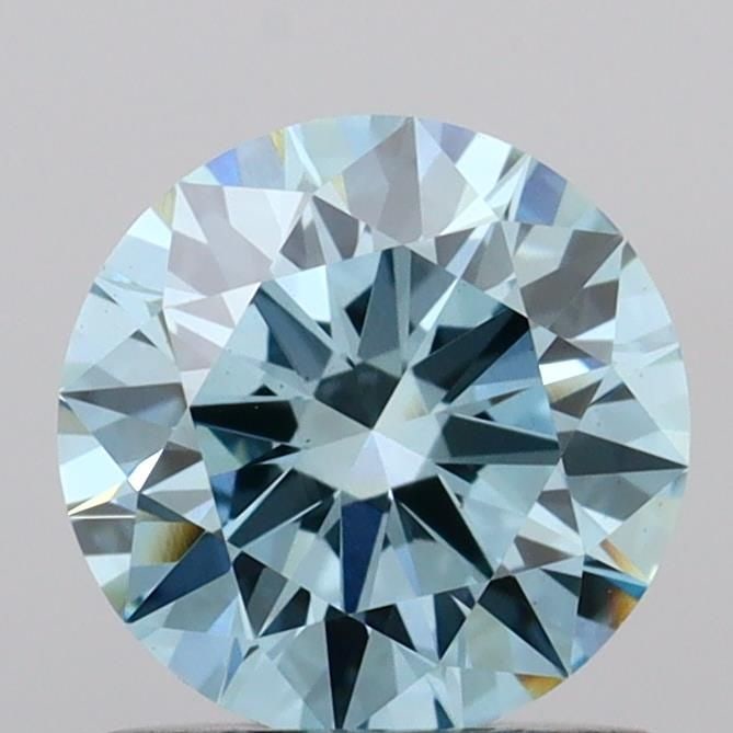 Ideal Loose Diamond - ROUND 0.94ct Fancy Vivid Blue VVS2: Ideal Loose Diamond - ROUND 0.94ct Fancy Vivid Blue VVS2 Source: This is a real non-mined Diamond that has been grown in a lab Shape: ROUND Carats: 0.94 Color: Fancy Vivid Blue Certification: IGI Vide
