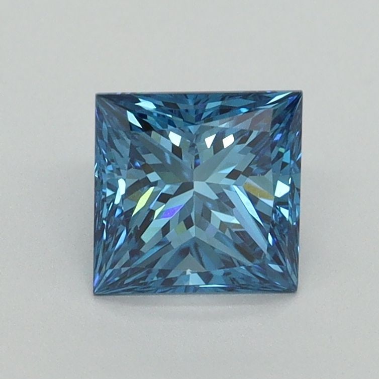 Loose Diamond - PRINCESS 1.01ct Fancy Vivid Blue VS2: Loose Diamond - PRINCESS 1.01ct Fancy Vivid Blue VS2 Source: This is a real non-mined Diamond that has been grown in a lab Shape: PRINCESS Carats: 1.01 Color: Fancy Vivid Blue Certification: IGI Video