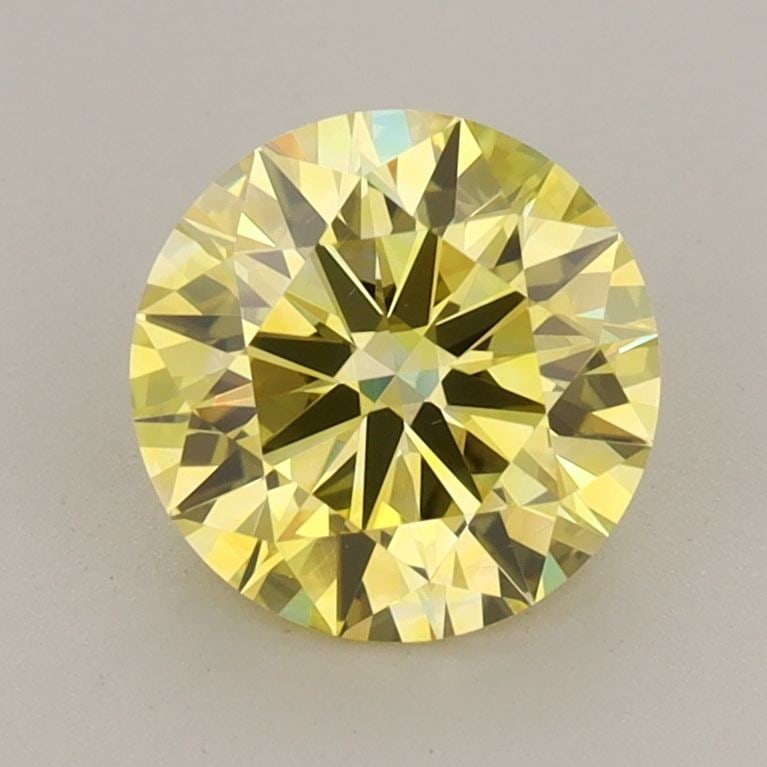 Ideal Loose Diamond - ROUND 1.42ct Fancy Vivid Yellow VS1: Ideal Loose Diamond - ROUND 1.42ct Fancy Vivid Yellow VS1 Source: This is a real non-mined Diamond that has been grown in a lab Shape: ROUND Carats: 1.42 Color: Fancy Vivid Yellow Certification: IGI V