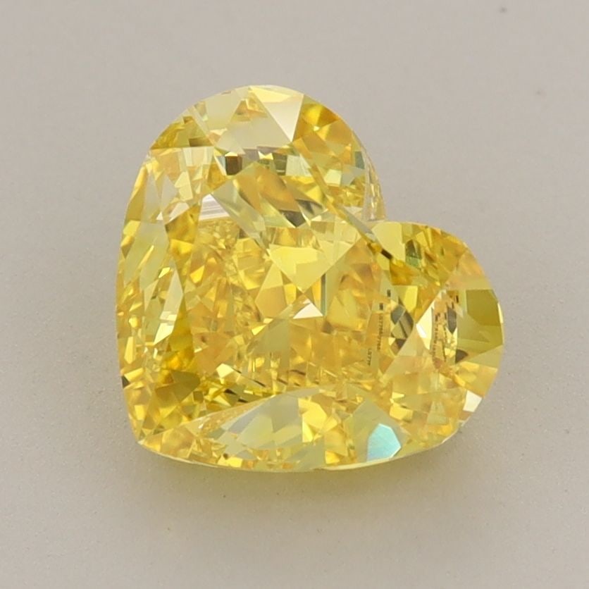 Loose Diamond - HEART 1.98ct Fancy Vivid Yellow VVS2: Loose Diamond - HEART 1.98ct Fancy Vivid Yellow VVS2 Source: This is a real non-mined Diamond that has been grown in a lab Shape: HEART Carats: 1.98 Color: Fancy Vivid Yellow Certification: IGI The Di