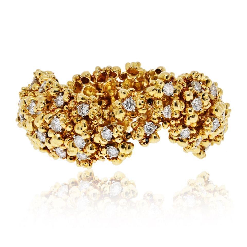 Tiffany Co 18K Yellow Gold Diamond Nugget Bracelet 12 Carats: Tiffany Co 18K Yellow Gold Diamond Nugget Bracelet 12 Carats This vintage Tiffany & Co. bracelet is crafted from 18K yellow gold and features a bold nugget-style design. It is set with approximately 1