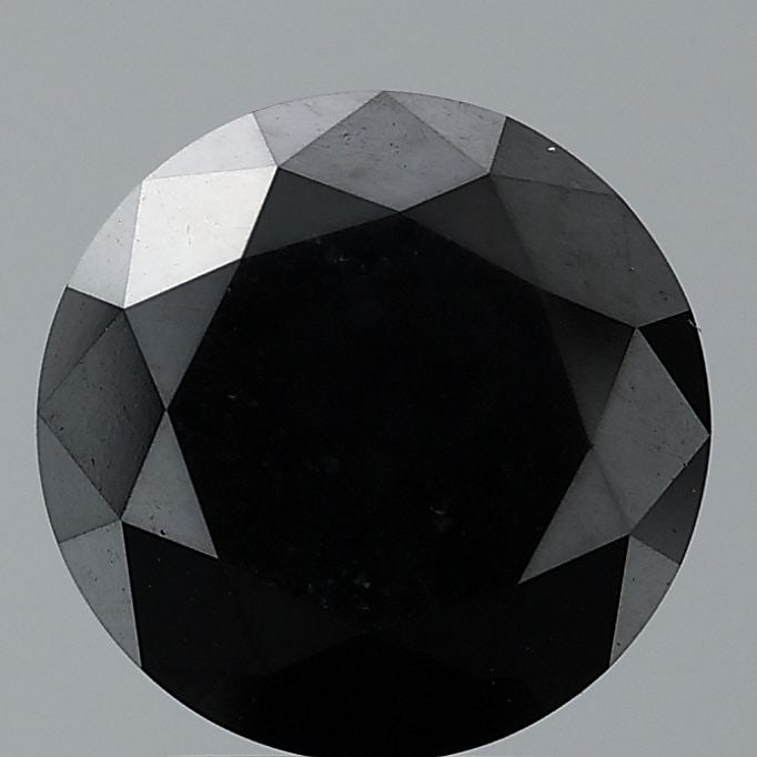 Loose Diamond - ROUND 0.84ct Fancy Black VVS2: Loose Diamond - ROUND 0.84ct Fancy Black VVS2 Source: Natural Shape: ROUND Carats: 0.84 Color: Fancy Black Certification: NONE Video: