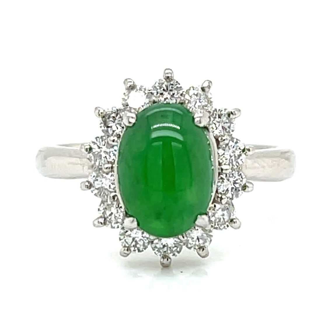 Platinum Ring GIA Certified 2.51 Ct Jade 14 Diamonds: Platinum Ring GIA Certified 2.51 Ct Jade 14 Diamonds This exquisite Platinum ring features a stunning GIA Certified 2.51 Ct. jade, beautifully complemented by 14 diamonds totaling 0.55 Ct. The diamond