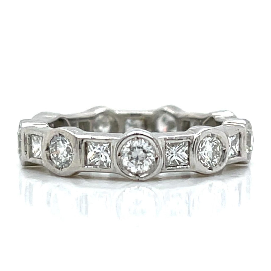 Platinum Diamond Eternity Band 2.15 Ct F-G Color VVS-VS Clarity: Platinum Diamond Eternity Band 2.15 Ct F-G Color VVS-VS Clarity This exquisite Platinum Eternity Band features a total diamond weight of 2.15 Ct, showcasing a stunning arrangement of 9 Round Diamonds 