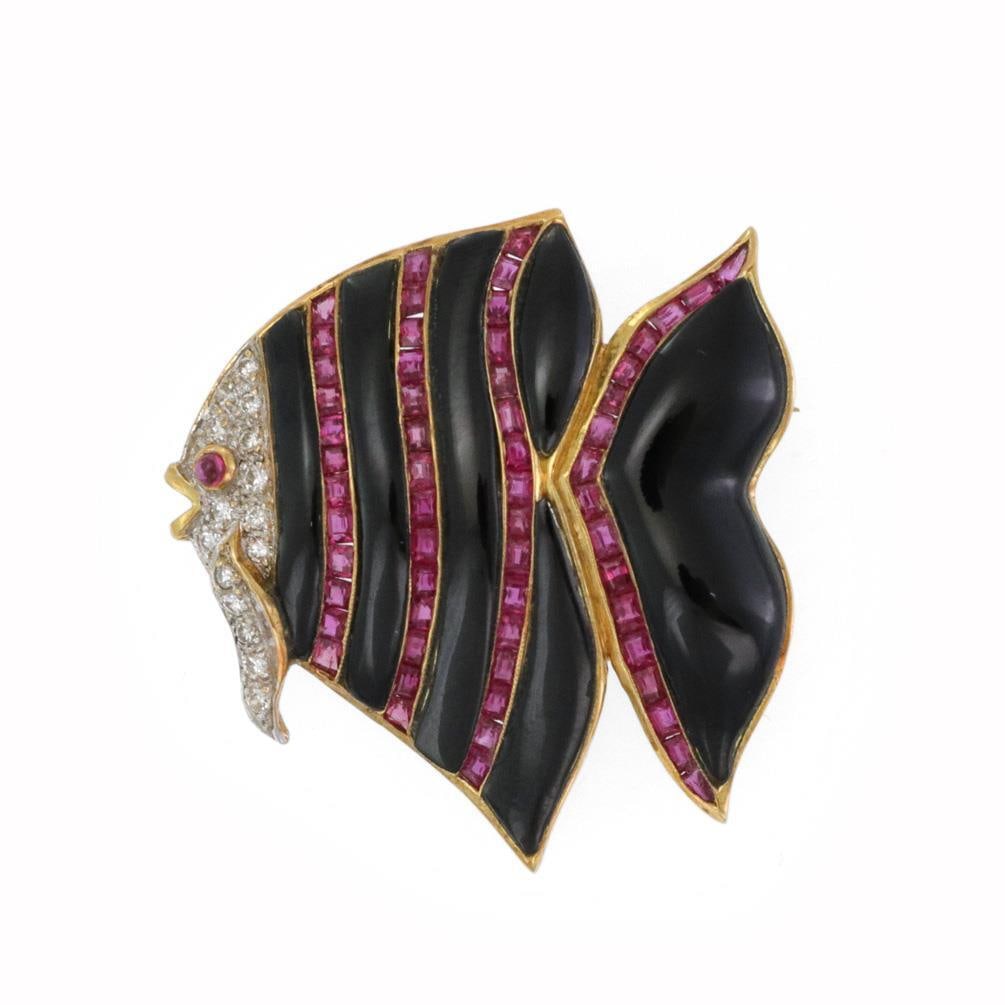 Elegant 18k Two Tone Gold Fish Brooch with Ruby and Onyx: Elegant 18k Two Tone Gold Fish Brooch with Ruby and Onyx This exquisite brooch features a delightful fish design, meticulously crafted from 18k yellow gold with elegant white gold accents. The body of