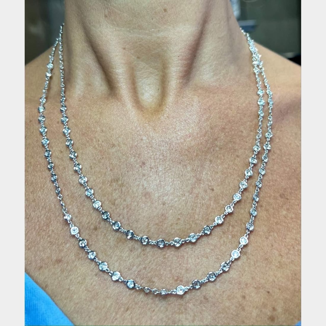Elegant 18K White Gold 15 Ct Diamond by the Yard Necklace: Elegant 18K White Gold 15 Ct Diamond by the Yard Necklace This exquisite 18K White Gold Necklace features a stunning design of diamonds set in an elegant 'by the yard' style. With a total diamond weig
