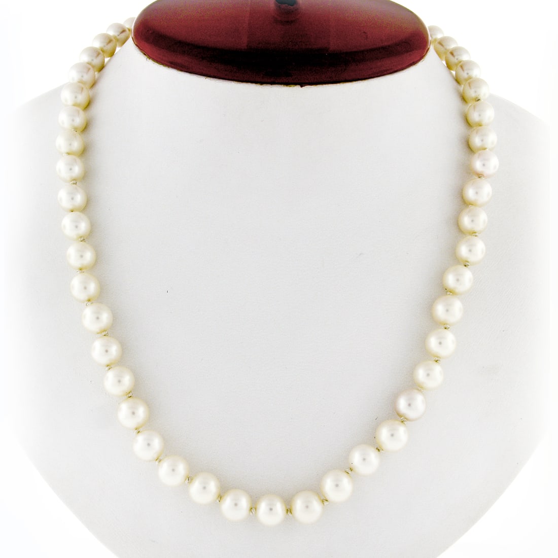 Elegant 18 Inch Cultured Pearl Necklace with 14K Gold Knot Clasp: Elegant 18 Inch Cultured Pearl Necklace with 14K Gold Knot Clasp This exquisite 18-inch pearl strand necklace features 50 genuine cultured pearls, expertly graduated from 7.5mm to 8.0mm in diameter. T