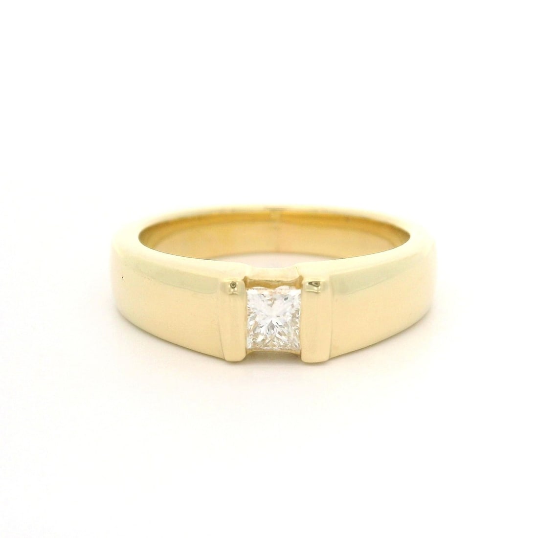 14k Yellow Gold 0.26ct Princess Cut Diamond Engagement Ring: 14k Yellow Gold 0.26ct Princess Cut Diamond Engagement Ring This exquisite engagement promise ring features a stunning 0.26ct natural princess cut diamond, elegantly channel set in solid 14k yellow go