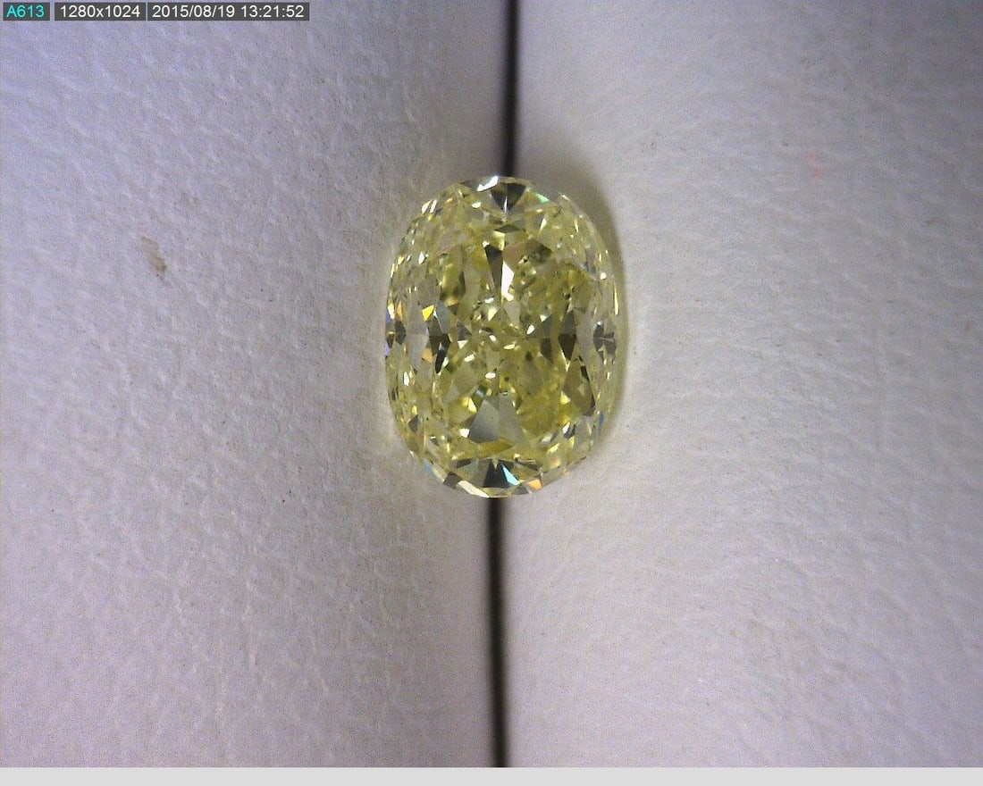 Loose Diamond - OVAL 0.73ct Fancy Yellow SI1: Loose Diamond - OVAL 0.73ct Fancy Yellow SI1 Source: Natural Shape: OVAL Carats: 0.73 Color: Fancy Yellow Certification: GIA The Diamond Depot Guarantee: All items in this auction are guaranteed to be