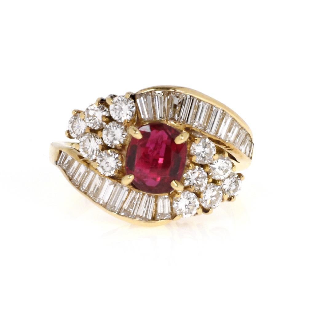 Elegant 18k Yellow Gold Ruby 2.64ct Diamond Bypass Cocktail Ring: Elegant 18k Yellow Gold Ruby 2.64ct Diamond Bypass Cocktail Ring This stunning cocktail ring showcases a beautiful oval-shaped ruby at its center, elegantly set in a bypass style frame adorned with sp