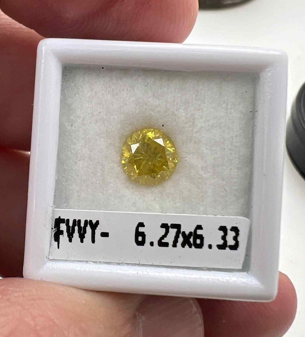 Loose Diamond - ROUND 1.14ct Fancy Vivid Yellow: Loose Diamond - ROUND 1.14ct Fancy Vivid Yellow Source: Natural Shape: ROUND Carats: 1.14 Color: Fancy Vivid Yellow Certification: GIA Video: