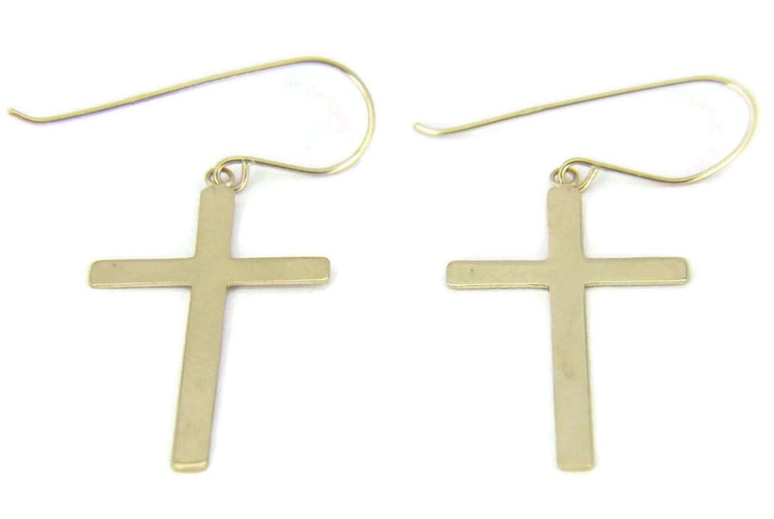 14k Yellow Gold Cross Drop Earrings: 14k Yellow Gold Cross Drop Earrings These vintage cross dangle earrings are crafted from solid 14k yellow gold, featuring an elegant elongated silhouette that allows for graceful movement. The polishe