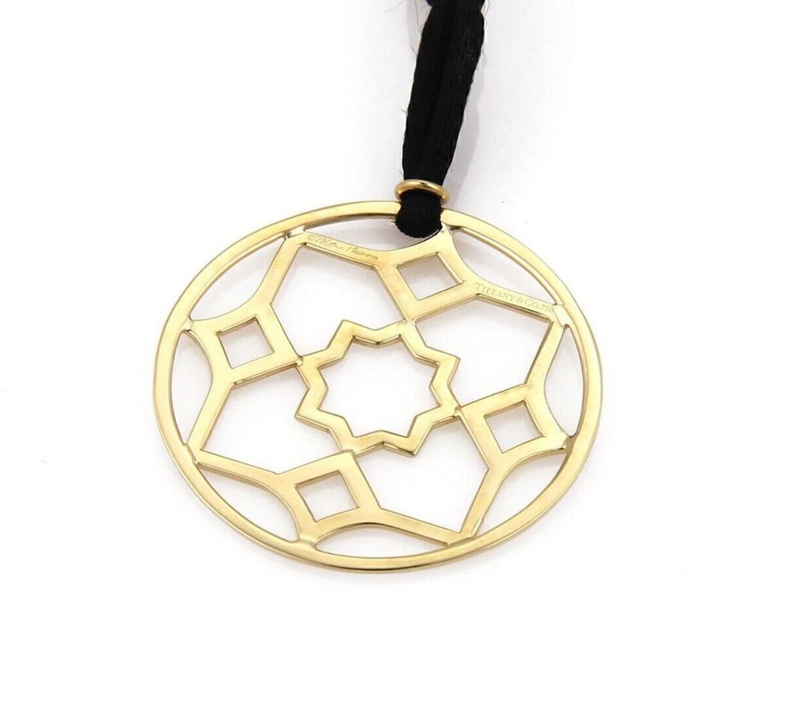 Paloma Picasso Zellige 18k Gold Medallion Necklace Tiffany & Co.: Paloma Picasso Zellige 18k Gold Medallion Necklace Tiffany & Co. This Tiffany & Co. Paloma Picasso Zellige medallion pendant necklace is crafted from 18k yellow gold. The necklace features a bold, scu