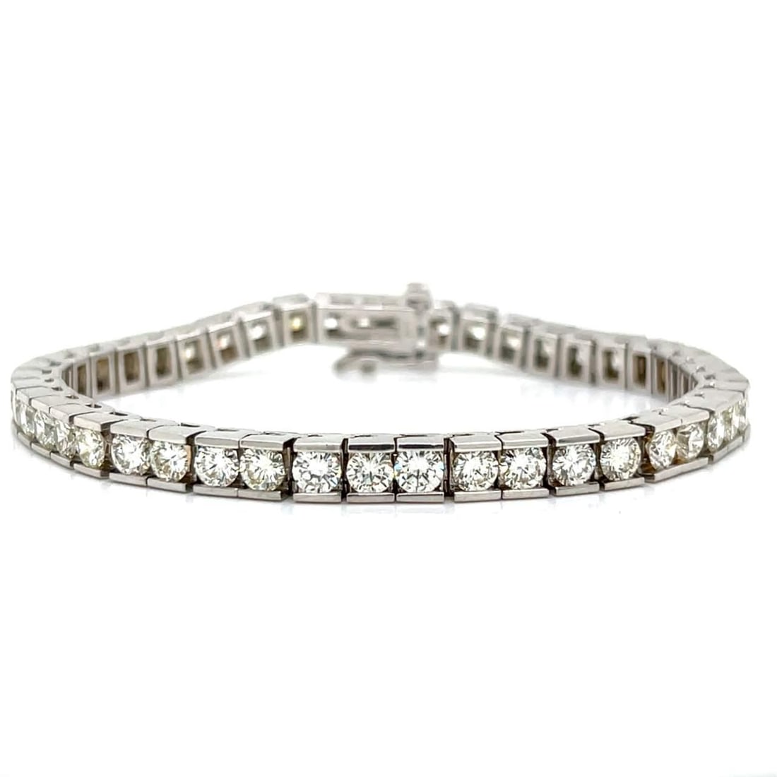 Elegant 14K White Gold 11.00 Ct Diamond Tennis Bracelet with 45 Stones: Elegant 14K White Gold 11.00 Ct Diamond Tennis Bracelet with 45 Stones This exquisite 14K white gold tennis bracelet features a stunning arrangement of 45 diamonds, collectively weighing approximately