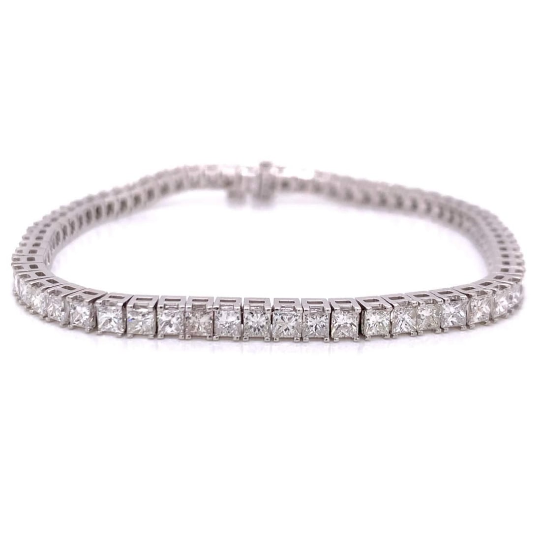 14K White Gold 8.00 Ct Princess-cut Diamond Tennis Bracelet: 14K White Gold 8.00 Ct Princess-cut Diamond Tennis Bracelet This exquisite tennis bracelet features a stunning arrangement of 56 princess-cut diamonds, totaling approximately 8.00 carats. Crafted from