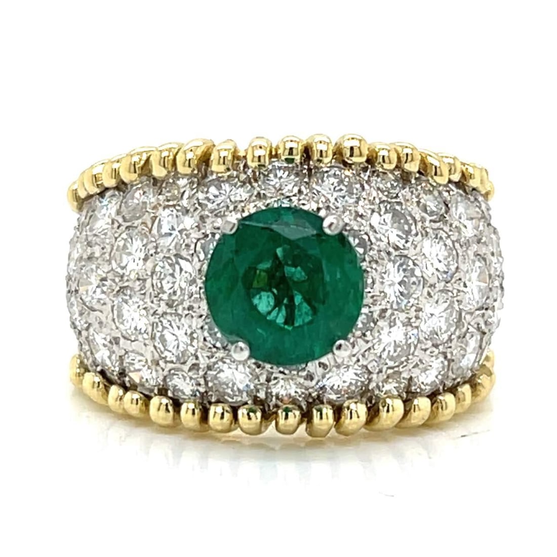 18K Yellow Gold Platinum Emerald Diamond Ring 1.76 Ct 4.25 Ct: 18K Yellow Gold Platinum Emerald Diamond Ring 1.76 Ct 4.25 Ct This exquisite ring is crafted from 18K yellow gold and platinum, showcasing a stunning 1.76 ct emerald at its center. Adorned with 72 dia