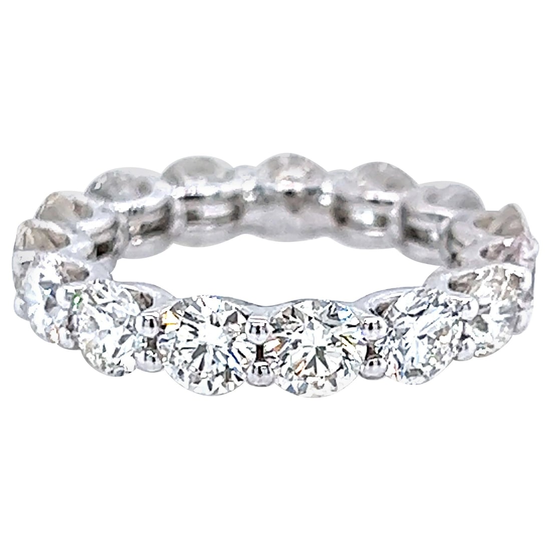 4.69ct Round Diamond Eternity Band 18k White Gold: 4.69ct Round Diamond Eternity Band 18k White Gold This stunning 4.69ct Round Diamond Eternity Band is crafted from luxurious 18k white gold and boasts a contemporary design. The ring features 15 round