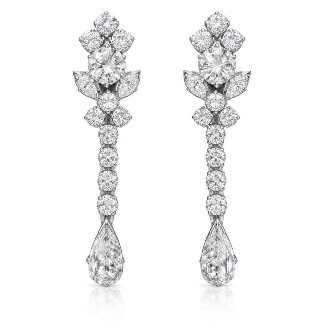 Diamond Drop Earrings in 18K White Gold with 6.10 Carat Total Weight: Diamond Drop Earrings in 18K White Gold with 6.10 Carat Total Weight These earrings are crafted from 18K white gold and feature a total of 28 diamonds weighing approximately 6.10 carats. The diamonds 