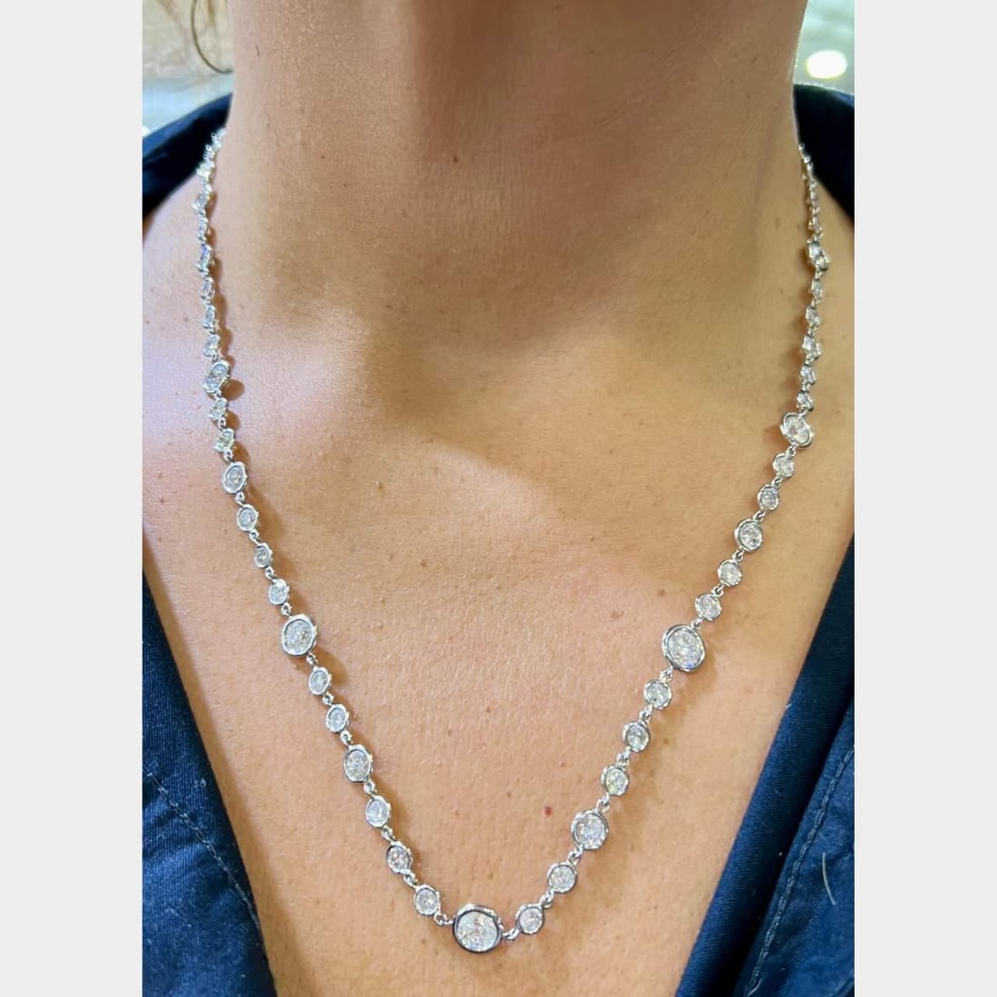 18K White Gold 15.25 Ct Diamond by the Yard Necklace 66 Diamonds: 18K White Gold 15.25 Ct Diamond by the Yard Necklace 66 Diamonds This exquisite 18K White Gold Diamond by the Yard Necklace features a stunning total of 66 diamonds, with an approximate weight of 15.2