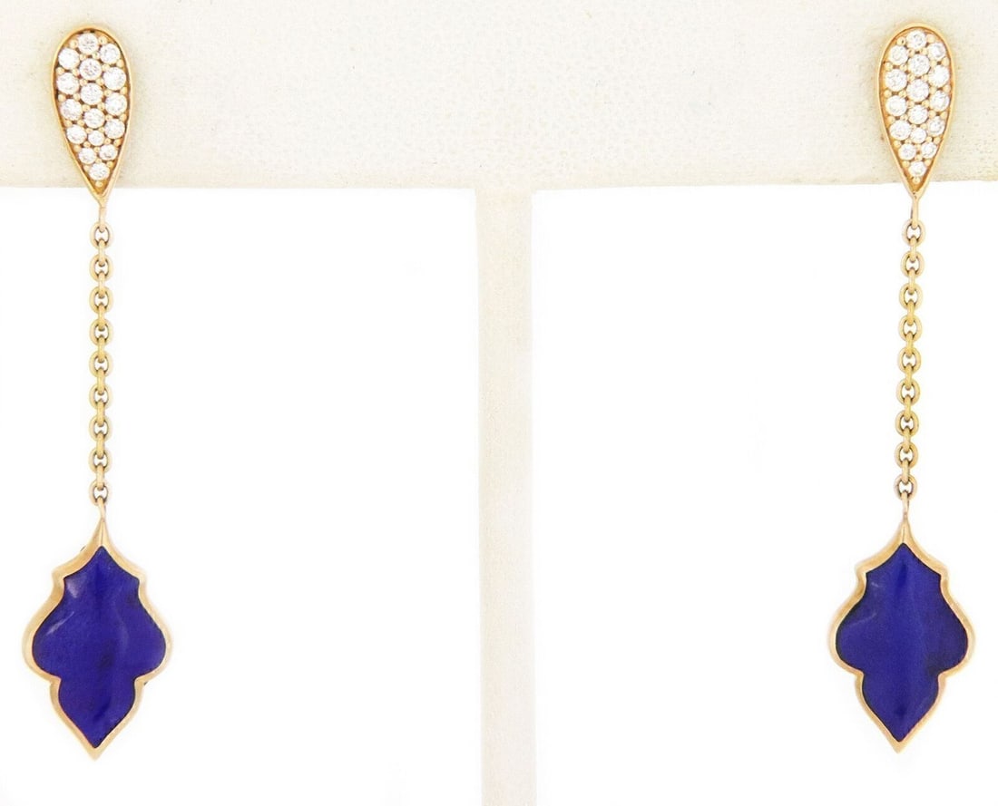Kabana Leaf Motif Lapis Diamond 14k Gold Dangle Earrings: Kabana Leaf Motif Lapis Diamond 14k Gold Dangle Earrings These authentic Kabana dangle earrings are crafted from 14k yellow gold and feature an elegant leaf motif. Each earring is centered with a deep