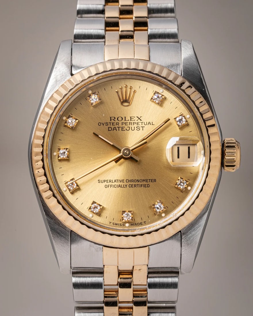 Ladies Datejust 31 Champagne Diamond Dial Jubilee Bracelet Ref 68273 Watch: Ladies Datejust 31 Champagne Diamond Dial Jubilee Bracelet Ref 68273 Watch This Rolex Datejust 31 features a champagne diamond dial, complemented by a fluted bezel and mounted on a Jubilee bracelet. D