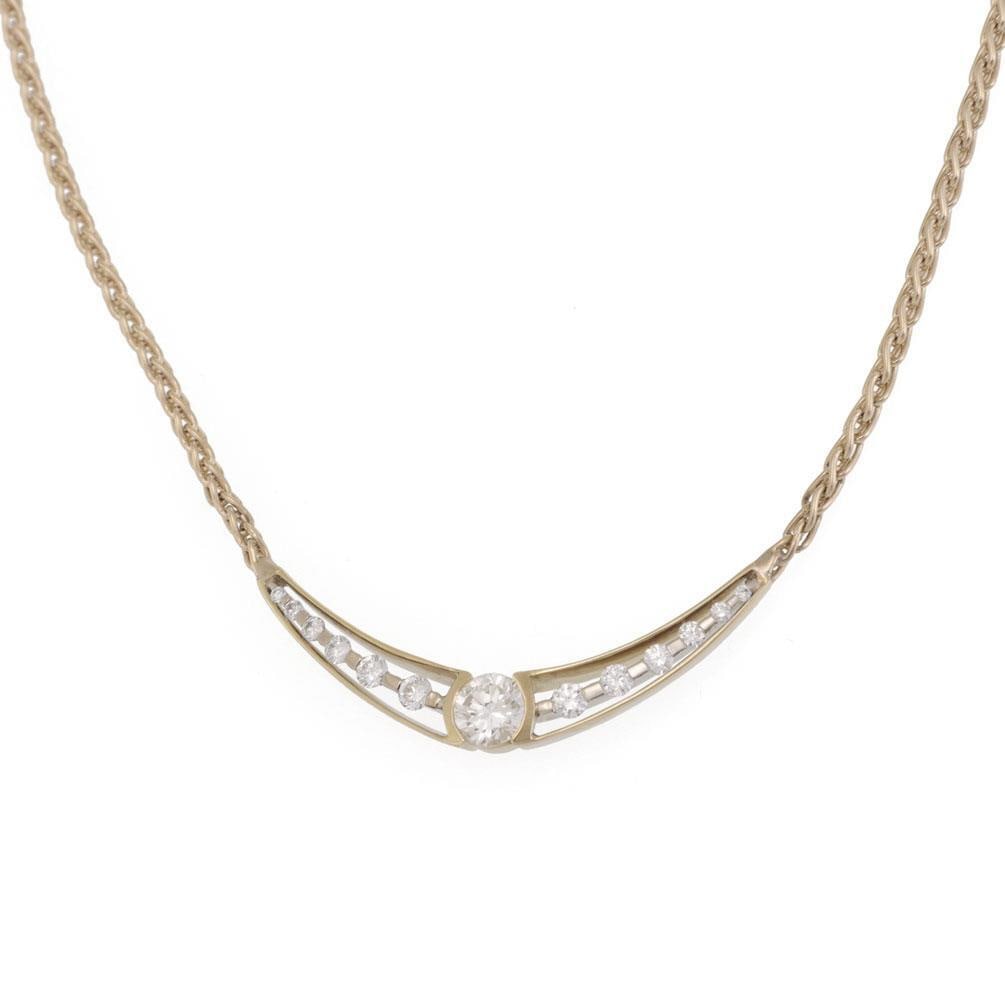 18k Yellow Gold Crescent Moon Diamond Pendant Necklace: 18k Yellow Gold Crescent Moon Diamond Pendant Necklace This elegant necklace features a crescent moon pendant crafted from 18k yellow gold, adorned with graduated size diamonds. The pendant highlights