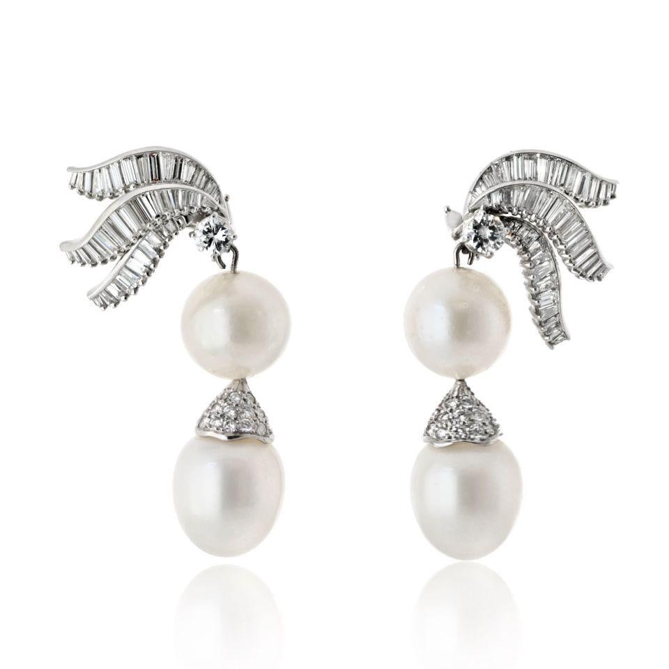 Versatile Platinum Pearl and 7 Carat Diamond Drop Earrings: Versatile Platinum Pearl and 7 Carat Diamond Drop Earrings Elevate your elegance with these stunning platinum pearl and diamond drop earrings. Crafted from high-quality platinum, these earrings featur