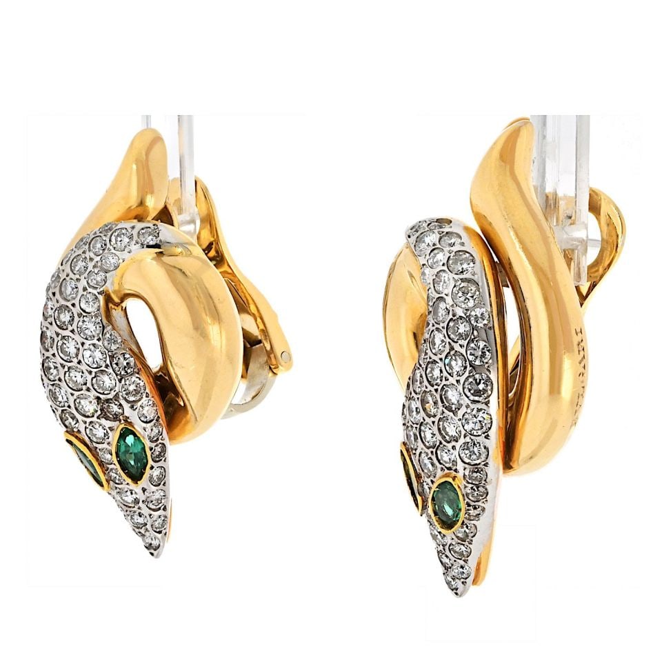 Bvlgari 18K Rose Gold Serpent Earrings with Diamonds and Emeralds: Bvlgari 18K Rose Gold Serpent Earrings with Diamonds and Emeralds These exquisite earrings from Bvlgari are crafted in luxurious 18K rose gold, weighing 20.1 grams. Featuring a stunning serpent motif 