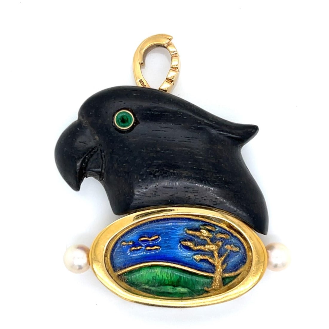 Parrot Pendant Crafted in 18K Yellow Gold and Wood by A. KIM: Parrot Pendant Crafted in 18K Yellow Gold and Wood by A. KIM This pendant by A. Kim features a parrot motif crafted from 18K yellow gold and wood. The piece weighs 28.1 grams and is in pre-owned condi