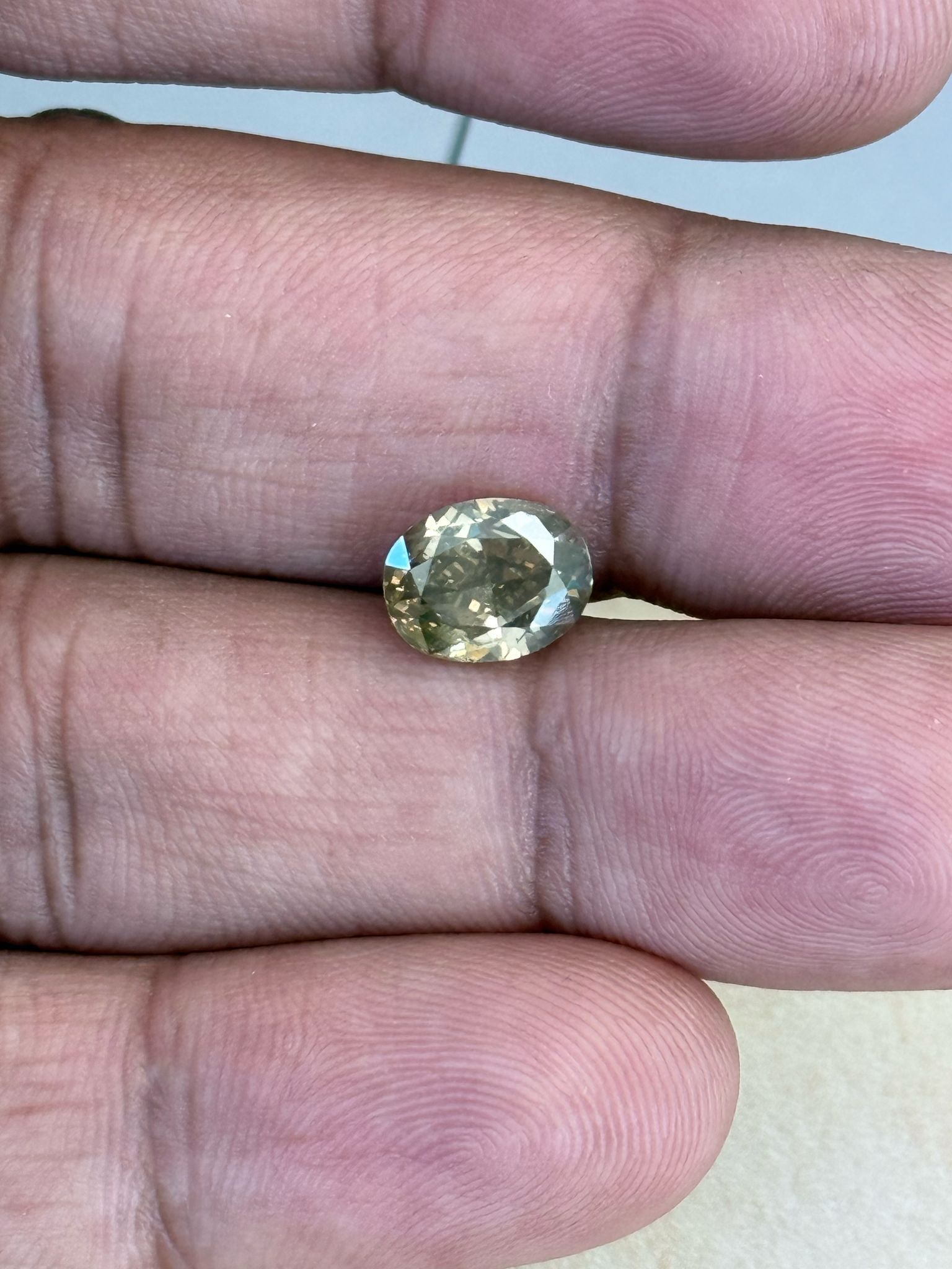 Loose Diamond - OVAL 1.54ct Fancy Yellowish Brown SI1: Loose Diamond - OVAL 1.54ct Fancy Yellowish Brown SI1 Source: Natural Shape: OVAL Carats: 1.54 Color: Fancy Yellowish Brown Certification: NONE The Diamond Depot Guarantee: All items in this auction a