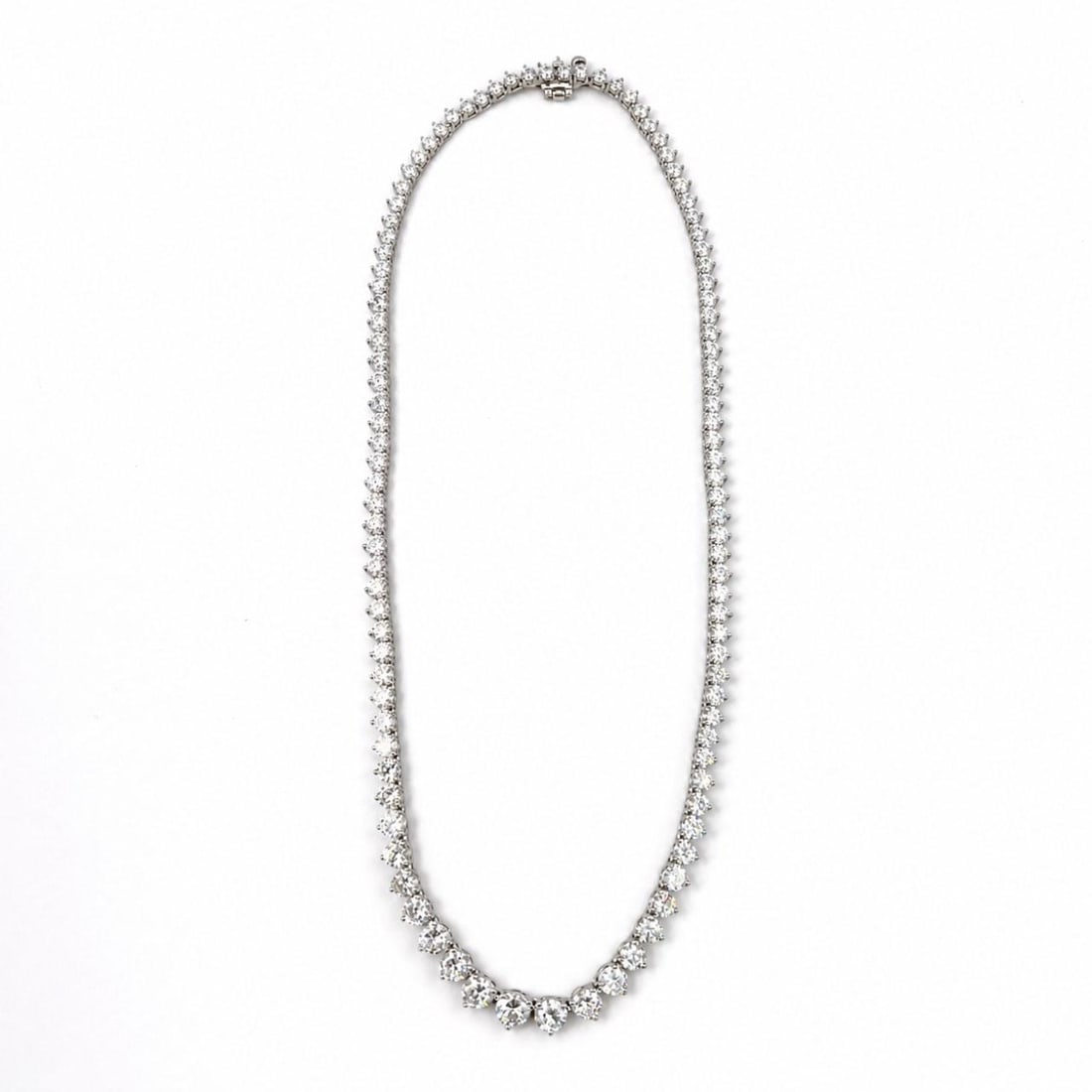 Graduated Diamond Necklace 14K White Gold 18.40 Ct 17 Inch: Graduated Diamond Necklace 14K White Gold 18.40 Ct 17 Inch This elegant necklace is crafted from 14K white gold and features a graduated design set with 107 diamonds totaling approximately 18.40 carat