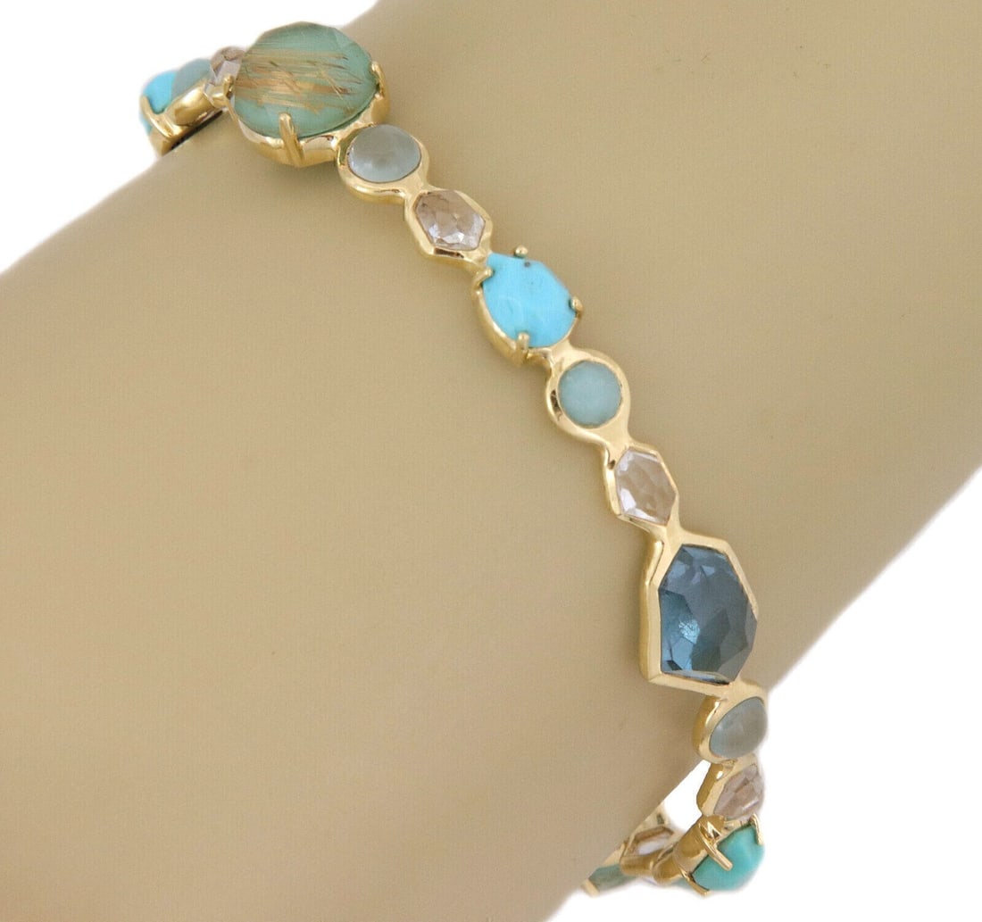 Ippolita Rock Candy 18k Yellow Gold Multi Gemstone Bangle Bracelet: Ippolita Rock Candy 18k Yellow Gold Multi Gemstone Bangle Bracelet This Ippolita Rock Candy bangle bracelet features a vibrant array of multi-colored gemstones, each bezel-set in polished 18k yellow g