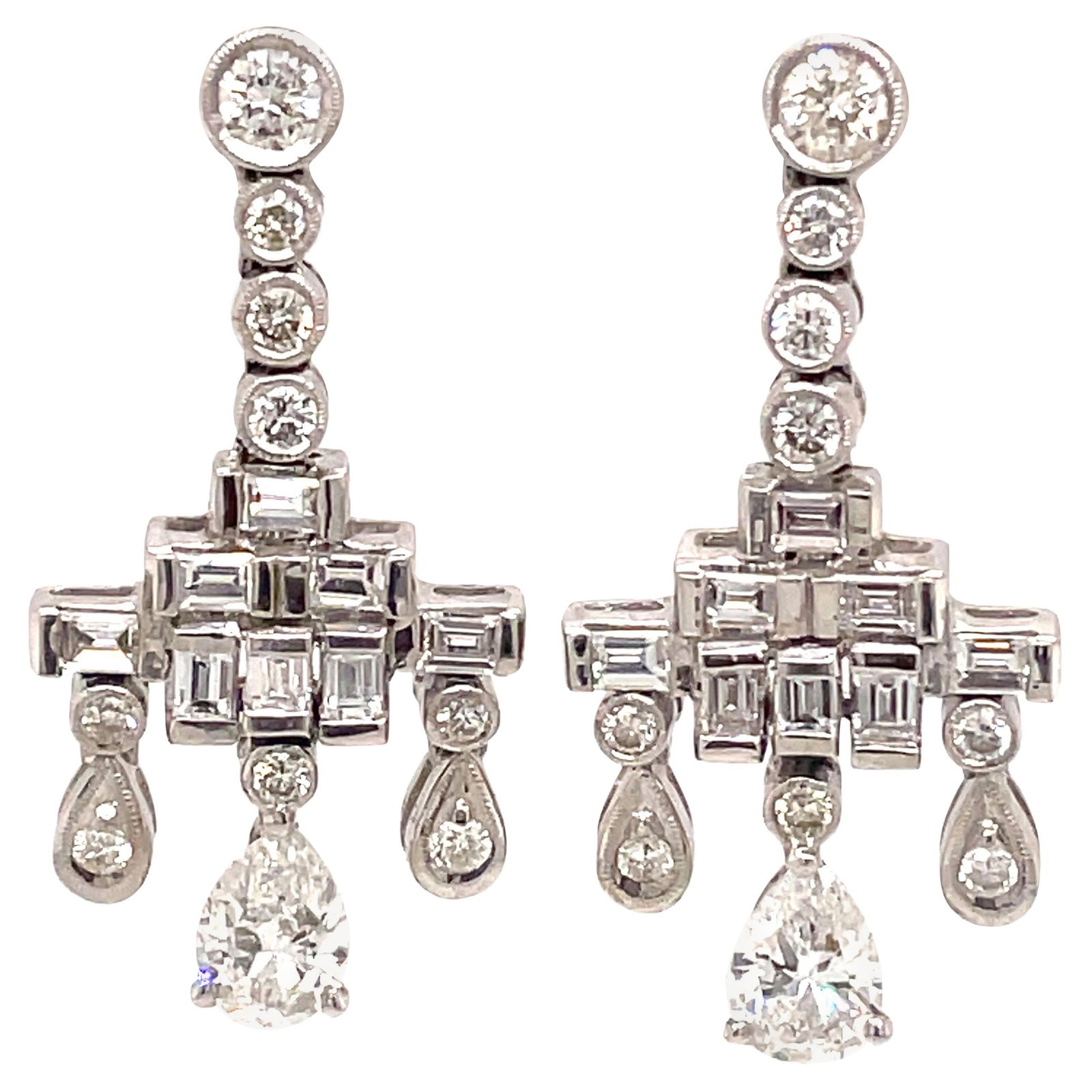 Art Deco 3.70ct Diamond Chandelier Earrings 18k White Gold: Art Deco 3.70ct Diamond Chandelier Earrings 18k White Gold These stunning Art Deco inspired chandelier earrings feature a total diamond weight of 3.70 carats. Crafted in 18k white gold, these earrings