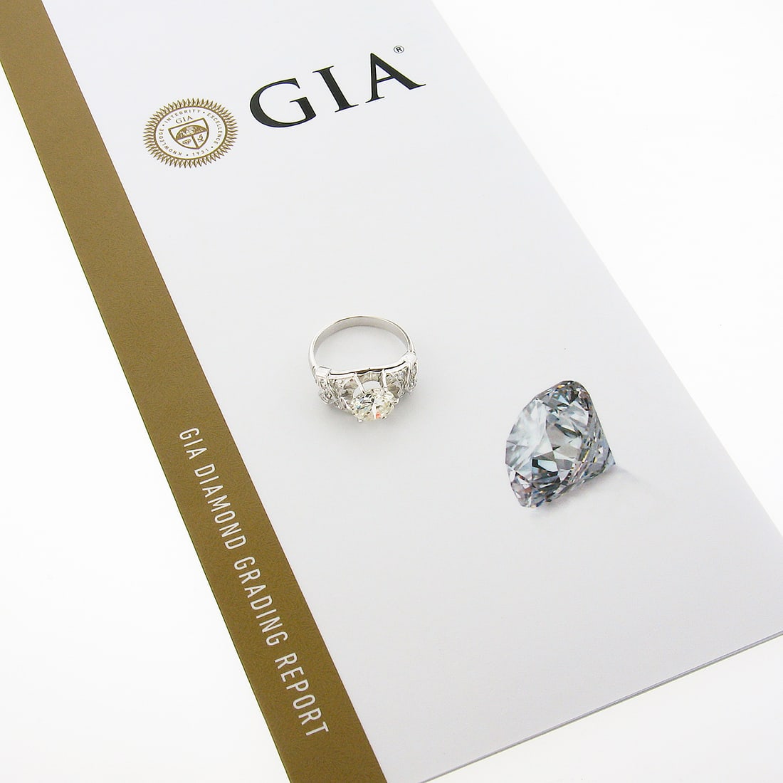 GIA Certified Platinum Diamond Engagement Ring 2.15ctw Round Accents Size 6.5: GIA Certified Platinum Diamond Engagement Ring 2.15ctw Round Accents Size 6.5 This vintage engagement ring, crafted in the 1940s, features a GIA-certified round brilliant cut diamond weighing 1.85 car