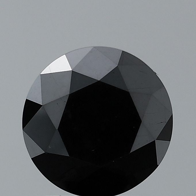 Loose Diamond - ROUND 0.77ct Fancy Black VVS2: Loose Diamond - ROUND 0.77ct Fancy Black VVS2 Source: Natural Shape: ROUND Carats: 0.77 Color: Fancy Black Certification: NONE Video: