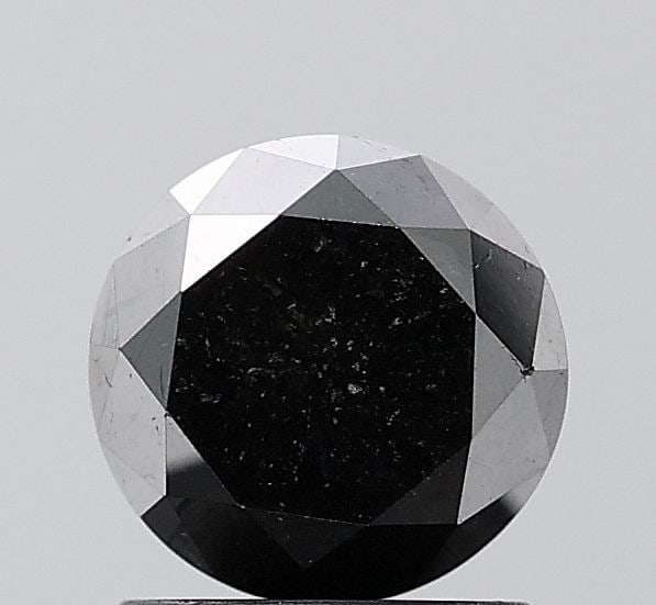 Loose Diamond - ROUND 1.75ct Black VVS2: Loose Diamond - ROUND 1.75ct Black VVS2 Source: Natural Shape: ROUND Carats: 1.75 Color: Black Certification: NONE Video: