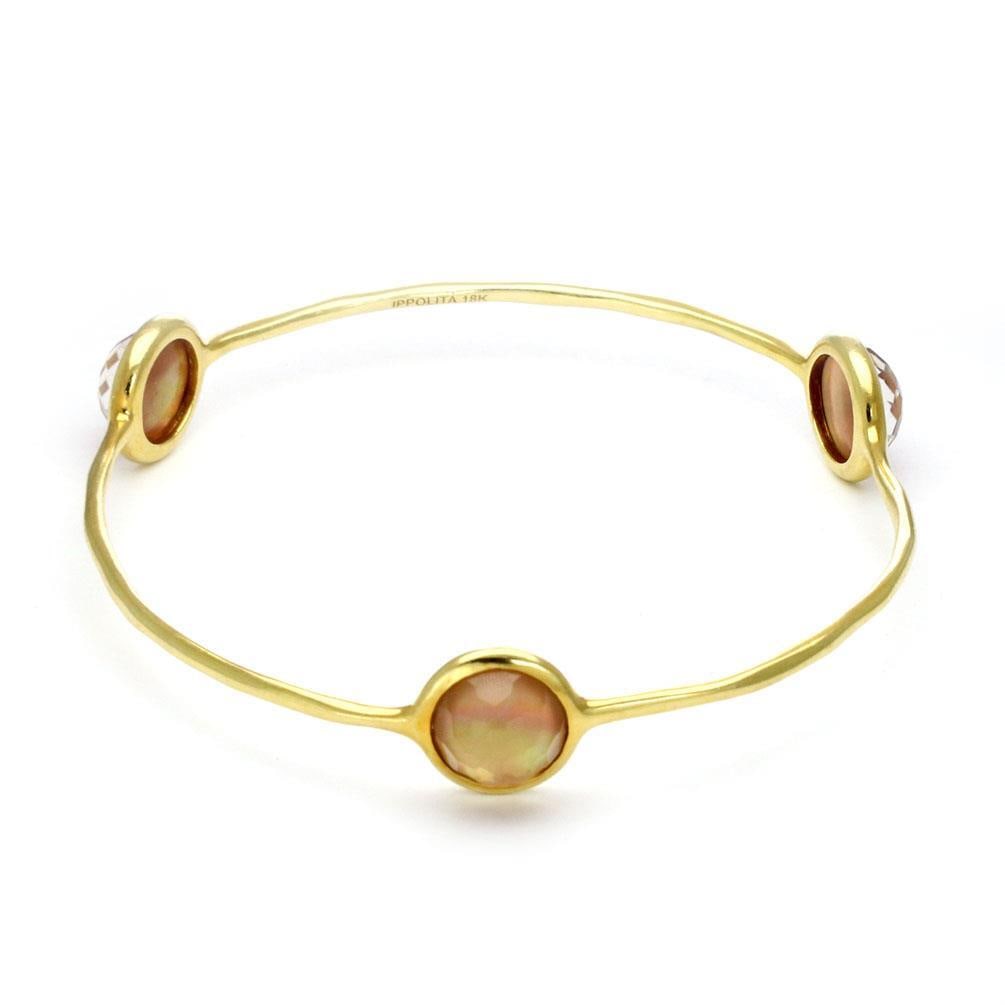Ippolita Rock Candy 18k Gold Bangle with Peach Quartz: Ippolita Rock Candy 18k Gold Bangle with Peach Quartz This exquisite bangle bracelet from Ippolita's Rock Candy collection features a stunning design crafted from 18k yellow gold with a polished finis