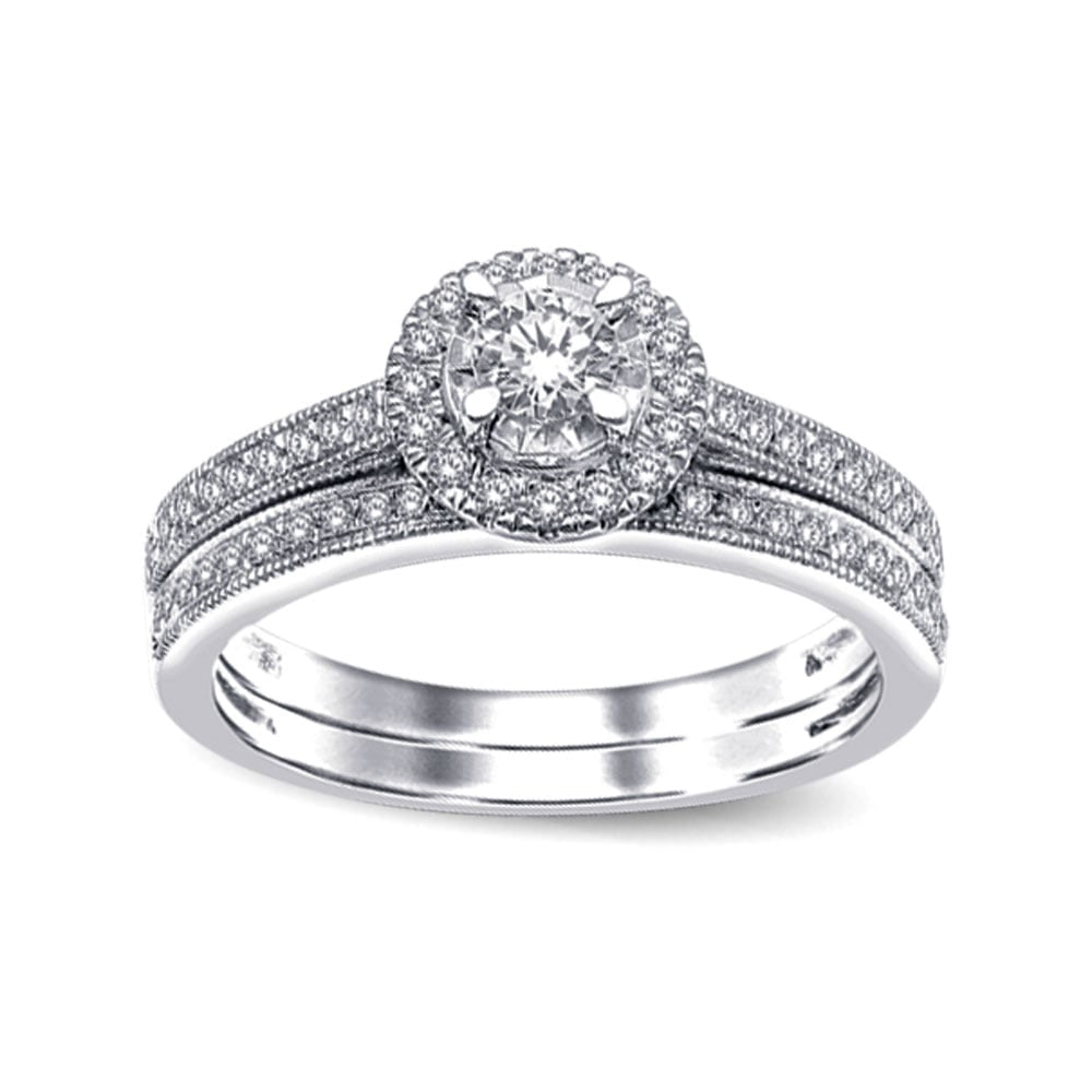 10K White Gold 1/2 Ct.tw Diamond Bridal Ring: 10K White Gold 1/2 Ct.tw Diamond Bridal Ring This amazing Bridal Ring is available in 10K White Gold. There is 1 round diamond with a total carat weight of 1/2 Ct.Tw. set in a micro prong setting. 10k