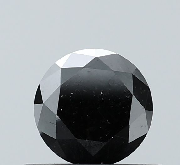 Loose Diamond - ROUND 0.58ct Fancy Black VVS2: Loose Diamond - ROUND 0.58ct Fancy Black VVS2 Source: Natural Shape: ROUND Carats: 0.58 Color: Fancy Black Certification: NONE Video: